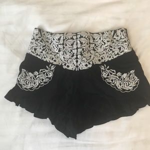 Black shorts white flowers